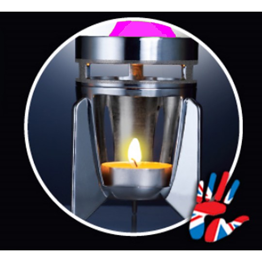 La vela de té se pone debajo de la lámpara