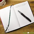 Encuadernación cosida con cinta marcapáginas