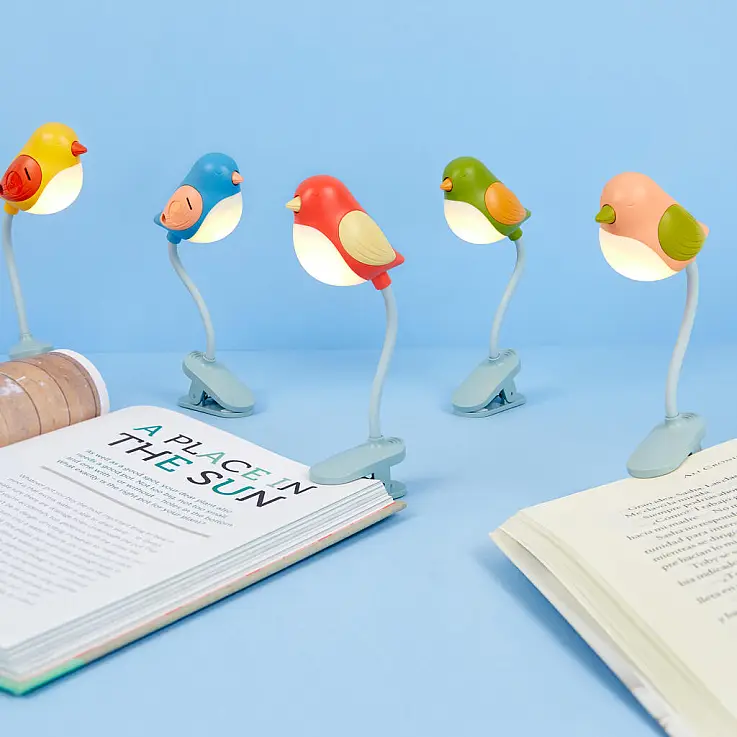 Luz de lectura en forma de pajarito