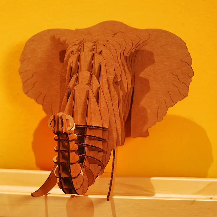 Una cabeza de elefante en tu pared