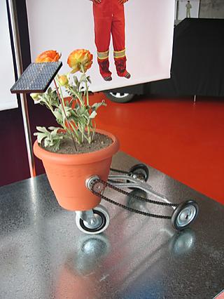 Solar-powered flowerpot with wheels. Your plants will run for the sun!