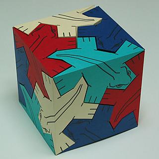 Cubo creado a partir de figuras de lagartijas